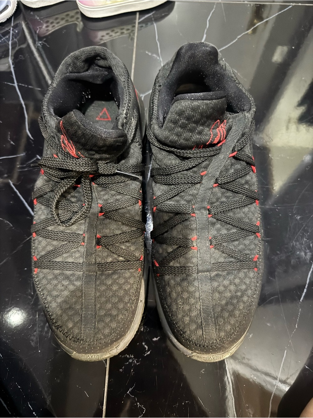 Nike Black Sneakers with Red Accents